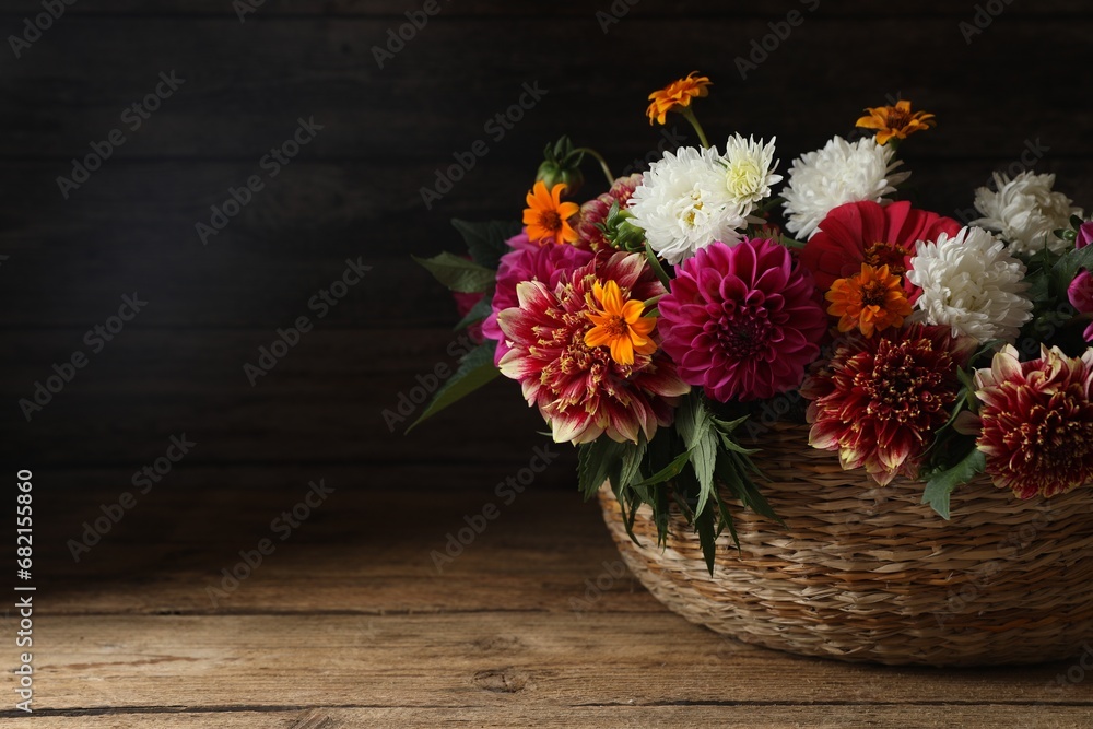 custom made wallpaper toronto digitalBeautiful wild flowers and leaves in wicker basket on wooden table. Space for text