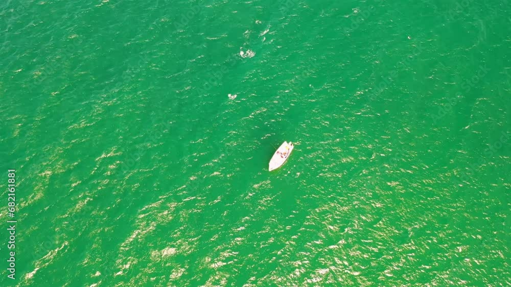 Aerial photo of small fishing boat in the Atlantic ocean Aerial photo of small fishing boat in the Atlantic ocean