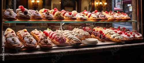 Walking down the streets of Catania, a Sicilian city renowned for its food and shopping, a passerby couldn't resist the dazzling display in the window of a fruit store: a perfectly set cherry cannoli