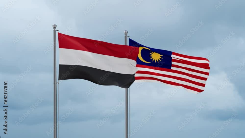Malaysia and Yemen flag waving together on cloudy sky, endless seamless loop, two country cooperation concept