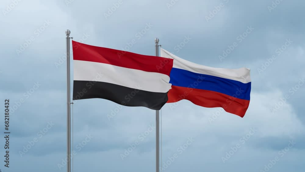 Russian Federation and Yemen flag waving together on cloudy sky, endless seamless loop Russian Federation and Yemen flag waving together on cloudy sky, endless seamless loop
