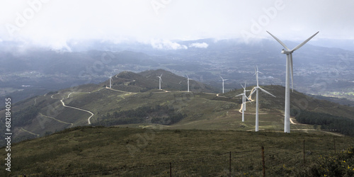 Alignment of wind turbines in Paradanta, Galicia - Wind turbines align seamlessly in the picturesque landscape of Paradanta, Galicia, captured by the Sony RX100.