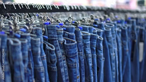 Shop fashionable denim pants. Cloth. photo