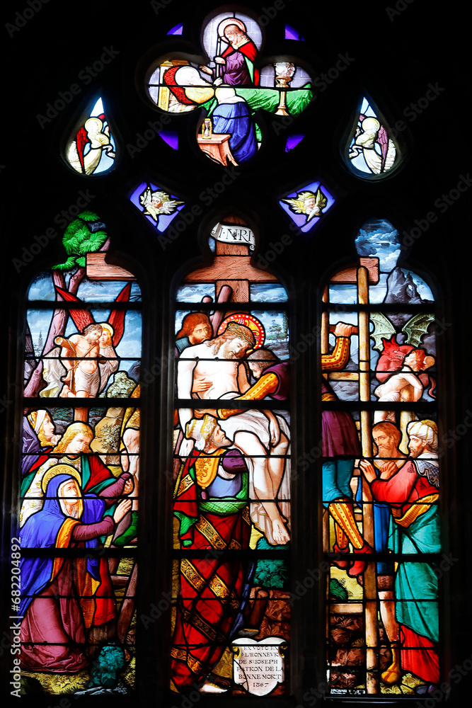 Sainte Croix (Holy Cross) church, Bernay, Eure, France. Stained glass. Jesus taken down from the cross.