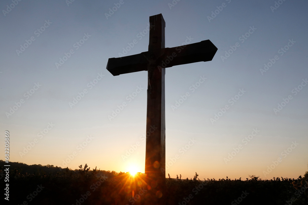 Cross at dusk at Le Bec Hellouin, Eure, France.