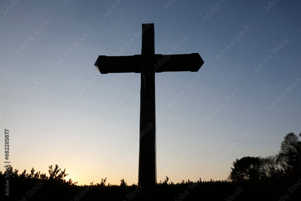 Cross at dusk at Le Bec Hellouin, Eure, France.