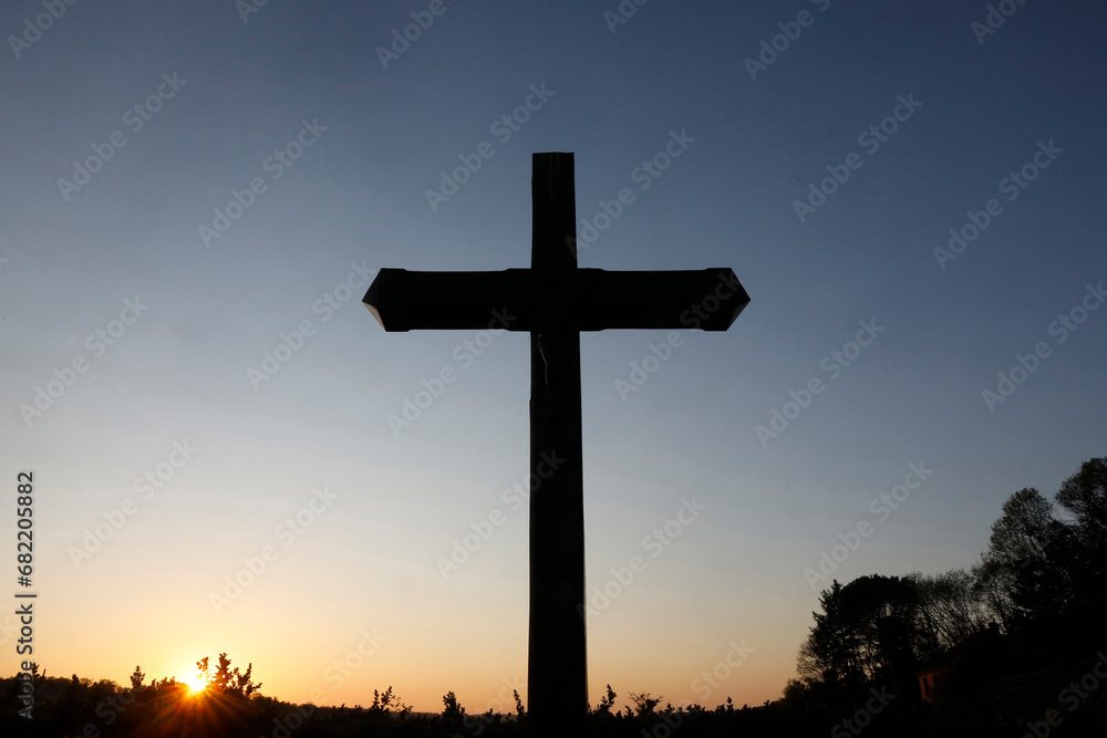 Cross at dusk at Le Bec Hellouin, Eure, France.