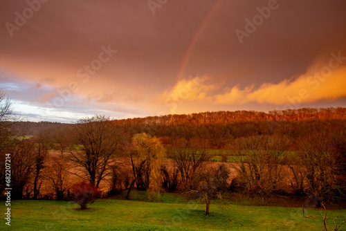 Winter landscape with rainbow. Eure, France.