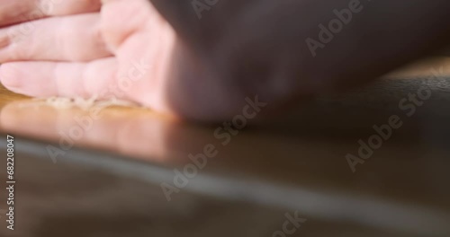 Wallpaper Mural Man's hand removes cut nails from workplace. Computer keyboard, office work, IT specialist. Concept of hygiene, workplace, cut nails. Torontodigital.ca