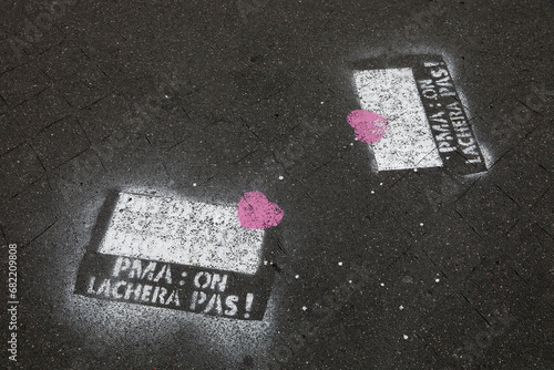 Anti-ART (assisted reproductive technology) graffiti outside a chuch in Paris, France. photo