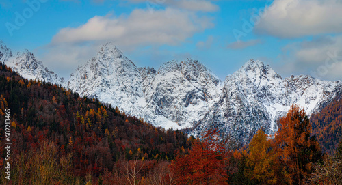 The mountain with blue sky view of alpine as snow-capped mount peaks in Winter mountains scene ,Triglav National Park ,Slovenia