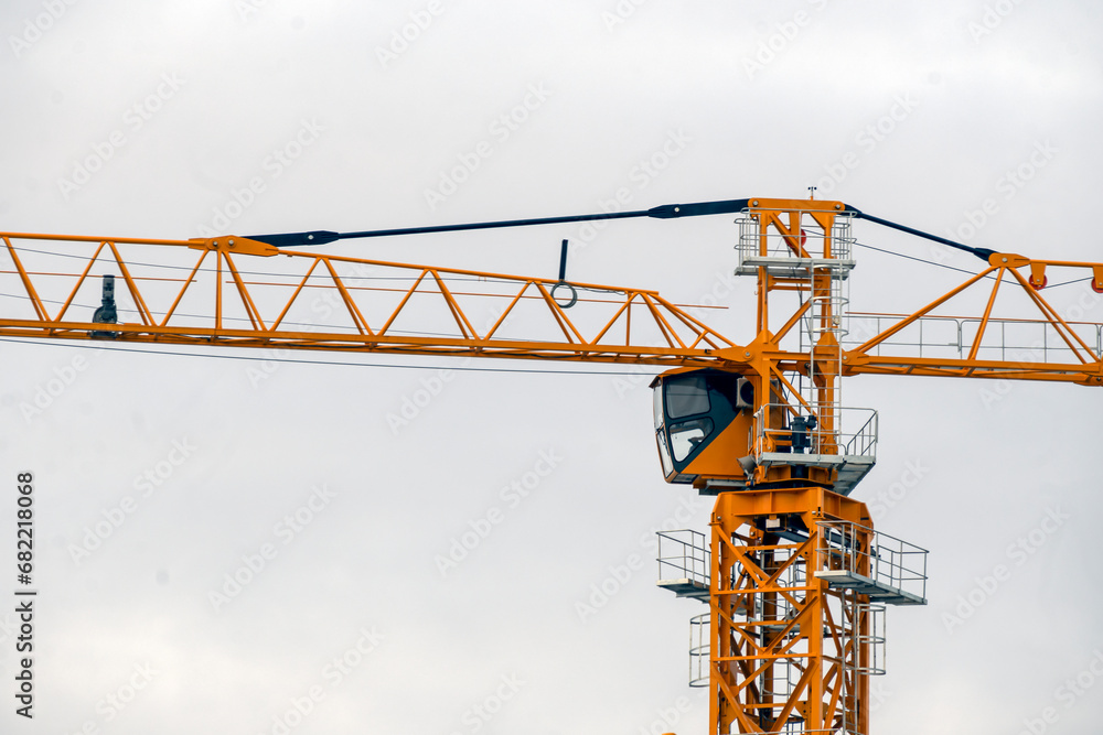 Fragment of a construction crane on a cloudy autumn day Fragment of a construction crane on a cloudy autumn day
