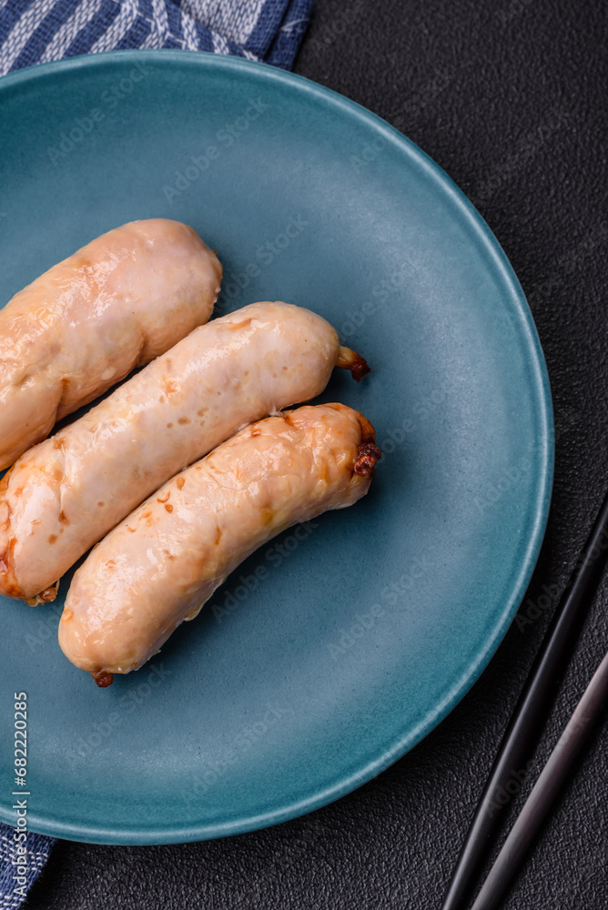 Delicious grilled chicken or pork sausages with salt, spices and herbs Delicious grilled chicken or pork sausages with salt, spices and herbs