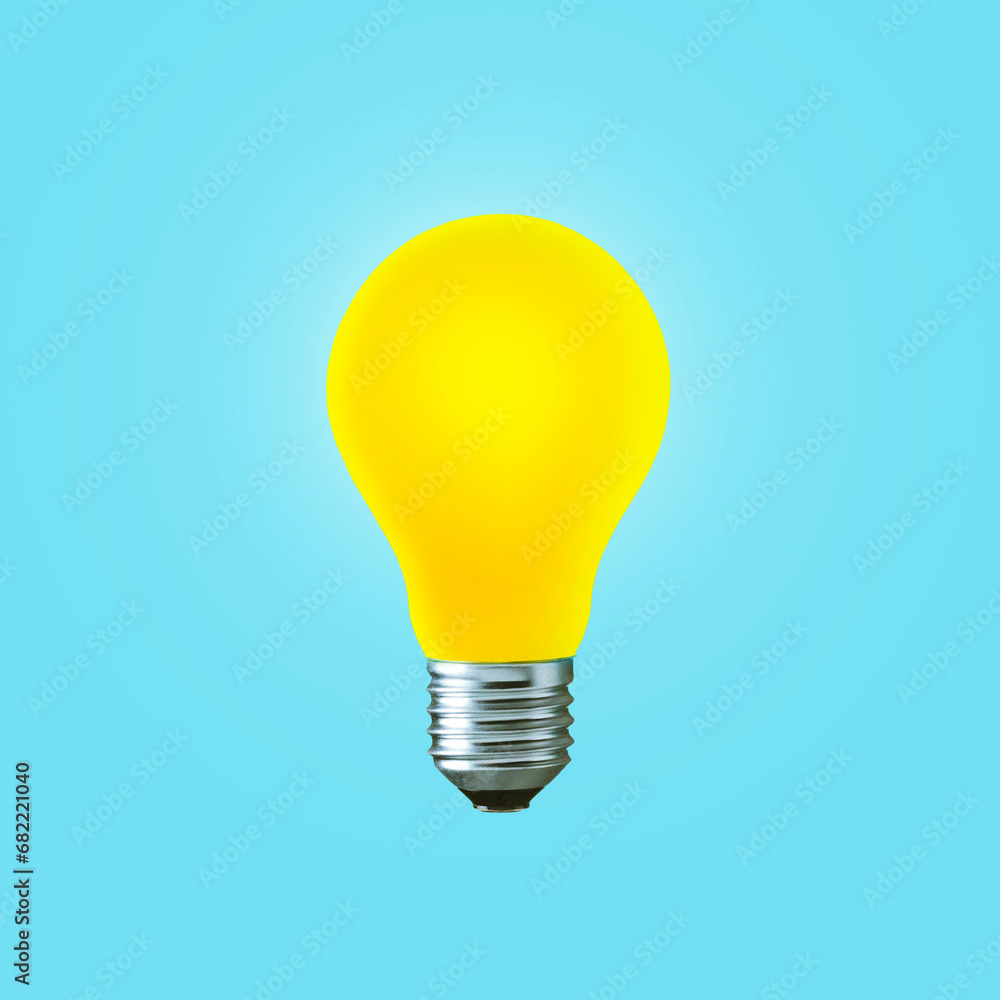 Creative yellow light bulb burns on a blue background, concept. Think differently, creative idea. Light came on. Thinking and start-up. Successful project Creative yellow light bulb burns on a blue background, concept. Think differently, creative idea. Light came on. Thinking and start-up. Successful project