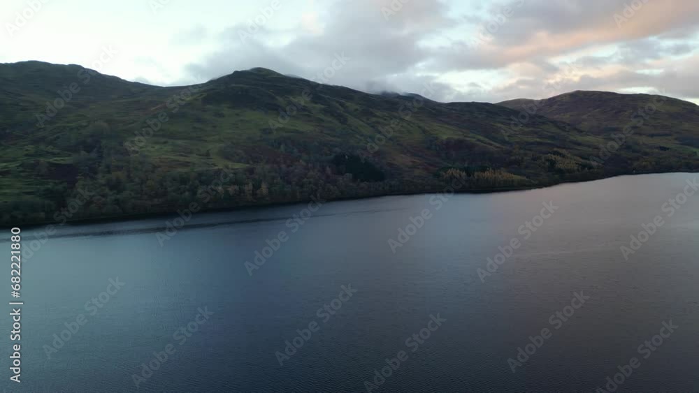 Aerial view of a beautiful sunrise in the Scottish Highlands at Loch Earn- Camera panning to the righ Aerial view of a beautiful sunrise in the Scottish Highlands at Loch Earn- Camera panning to the righ