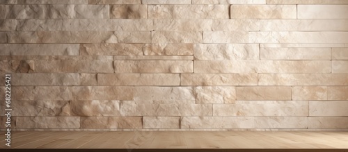 The natural beige stone wall showcased a detailed rectangle texture with a smooth marble surface that added an elegant touch to the material. photo