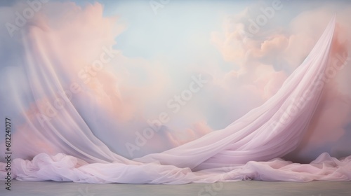  a white cloth draped over a floor in front of a backdrop of pink and white clouds and a blue sky with white clouds in the center of the photo is the image. © Olga