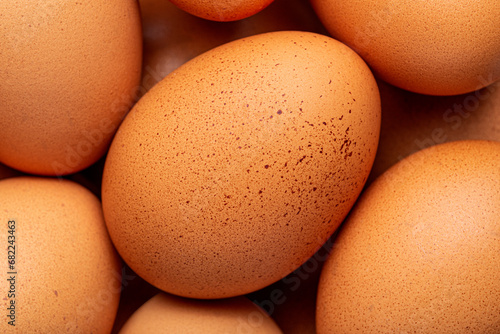 Organic brown eggs background