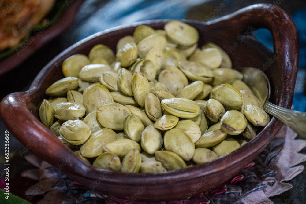 Bean of Parkia speciosa, the bitter bean, twisted cluster bean, sator bean, or stink bean, is a delicious culinary food from Indonesia Bean of Parkia speciosa, the bitter bean, twisted cluster bean, sator bean, or stink bean, is a delicious culinary food from Indonesia