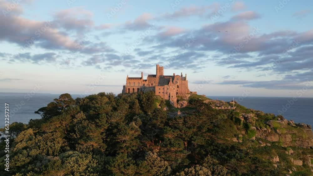 Aerial view of a castle on St Michael's Mount at sunset, Marazion, England, UK Aerial view of a castle on St Michael's Mount at sunset, Marazion, England, UK