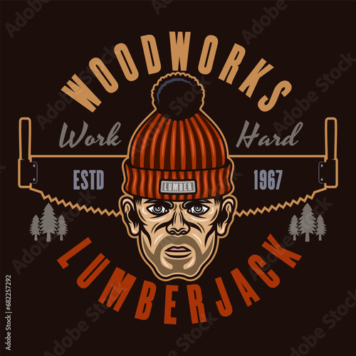 Lumberjack head in knitted hat and saw vector emblem in colored style on dark background