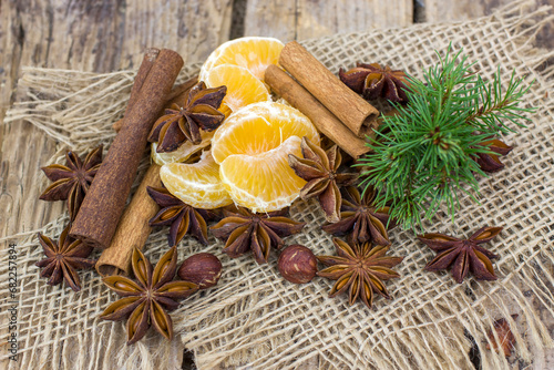 cinnamon sticks, star anise spices, tangerine and nuts