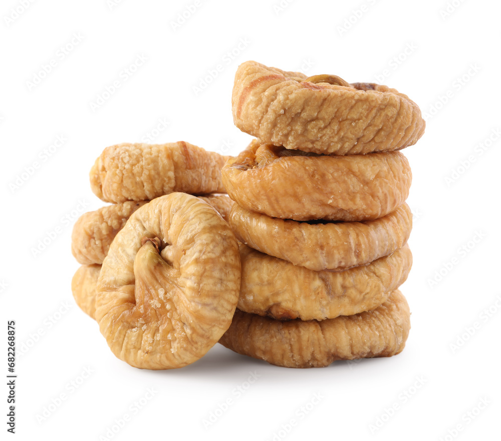 Stacked tasty dried figs isolated on white Stacked tasty dried figs isolated on white