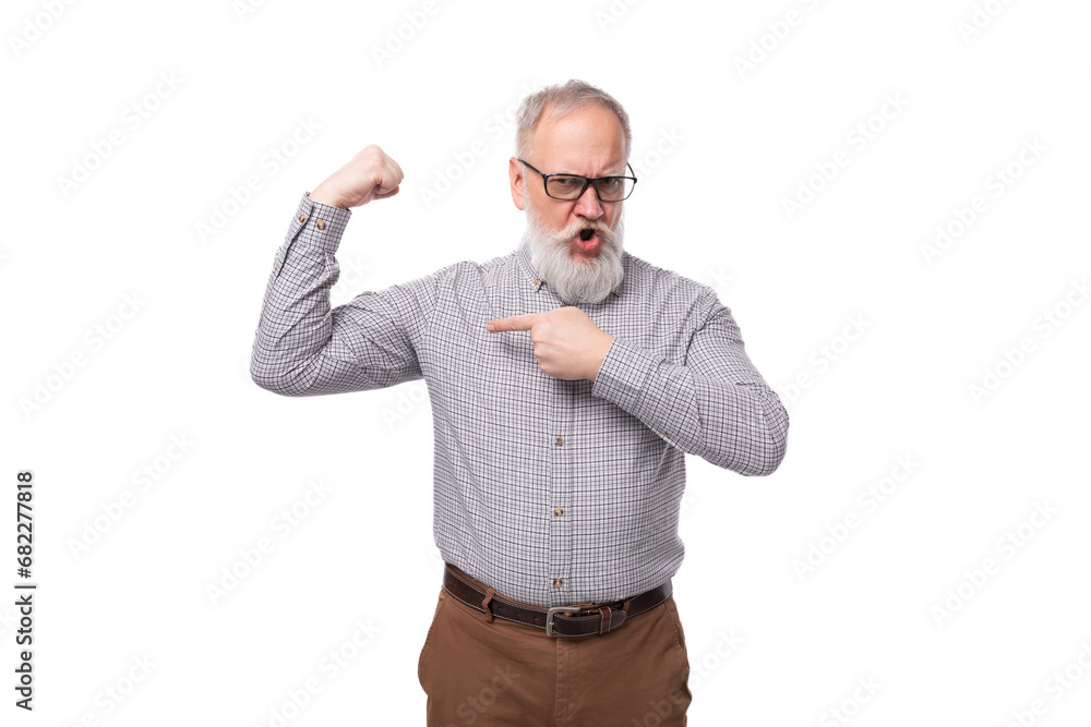 a gray-haired mature man with a beard and mustache in trousers and a shirt is emotionally annoyed a gray-haired mature man with a beard and mustache in trousers and a shirt is emotionally annoyed