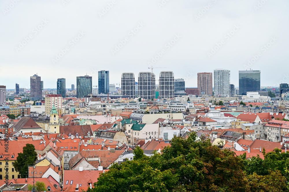 Bratislava, Slovakia: panoramic view of buildings in city. Historical buildings in old town and modern buildings in distance. Bratislava is capital of Slovak Republic. Skyscrapers.
