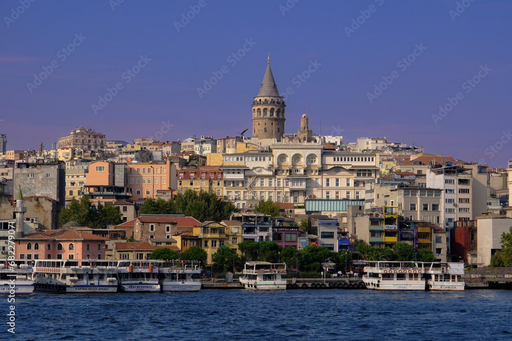 A photo of Galata Tower and many type of buildings