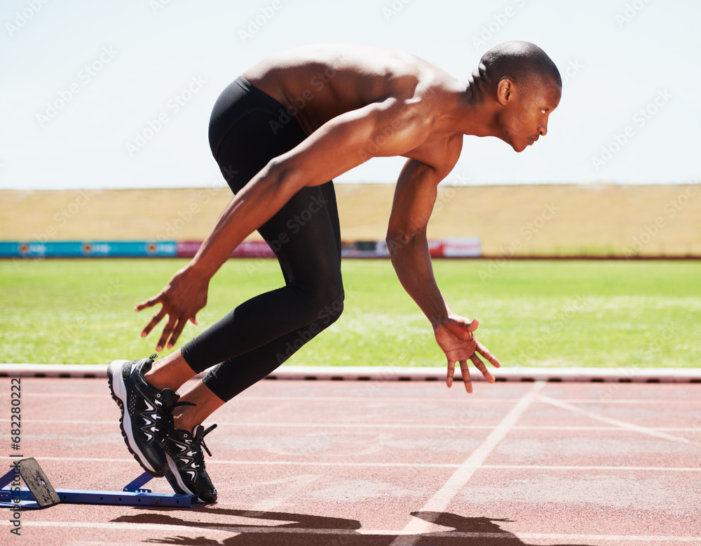 Man, runner and starting line for sprint, athlete and ready for marathon, wellness and race or competition. Black male person, training and exercising or active, practice and blocks for fitness Man, runner and starting line for sprint, athlete and ready for marathon, wellness and race or competition. Black male person, training and exercising or active, practice and blocks for fitness