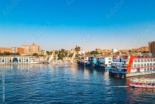 View of the Aswan waterfront from the Nile River. © lizavetta