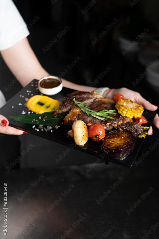 meat board on a black background