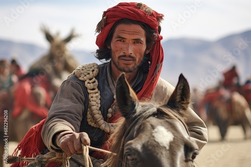 a close-up shot of a buzkashi player, helmet on and whip in hand photo