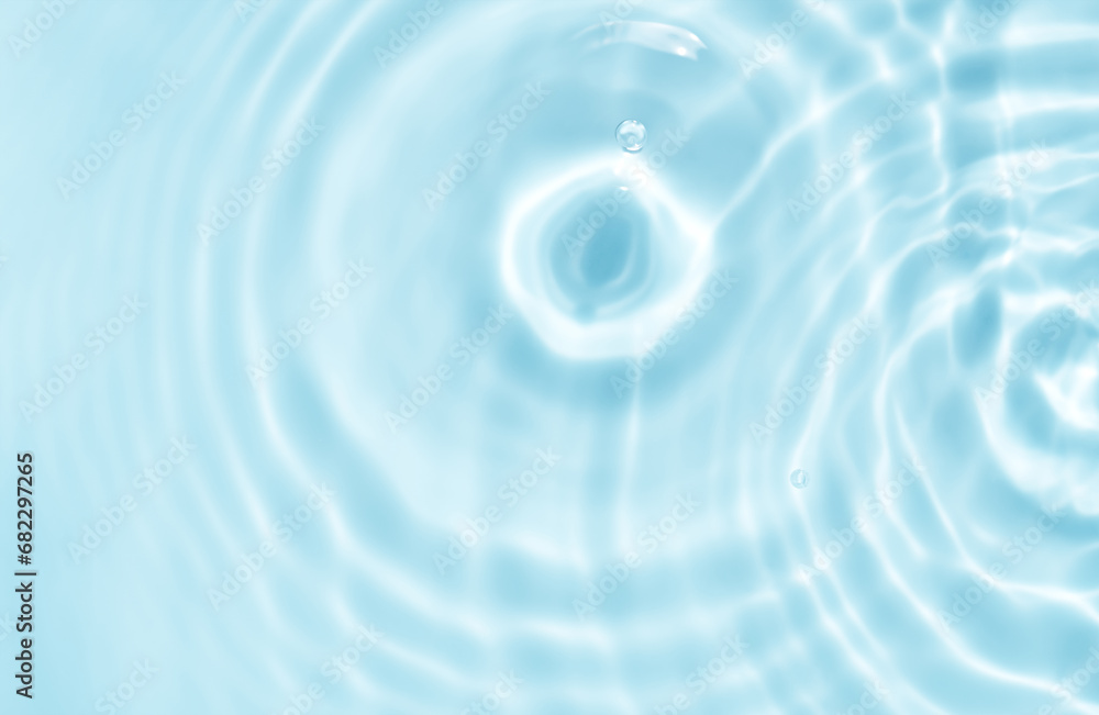 Water texture surface with drop,ripples,splash,Background Banner Aqua Blue transparent of water waves in sunlight with copy space,Top view Backdrop for Winter Cosmetic,Moisturiser water micellar toner Water texture surface with drop,ripples,splash,Background Banner Aqua Blue transparent of water waves in sunlight with copy space,Top view Backdrop for Winter Cosmetic,Moisturiser water micellar toner