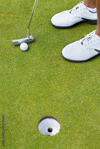 Sports, golf hole and shoes of person on course playing game, practice and training for competition. Professional golfer, grass and closeup of tee, ball and golfing club for winning stroke or score