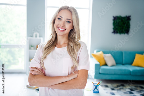 Photo of lovely cute girl with crossed hands enjoying break pause relax rest modern home indoors