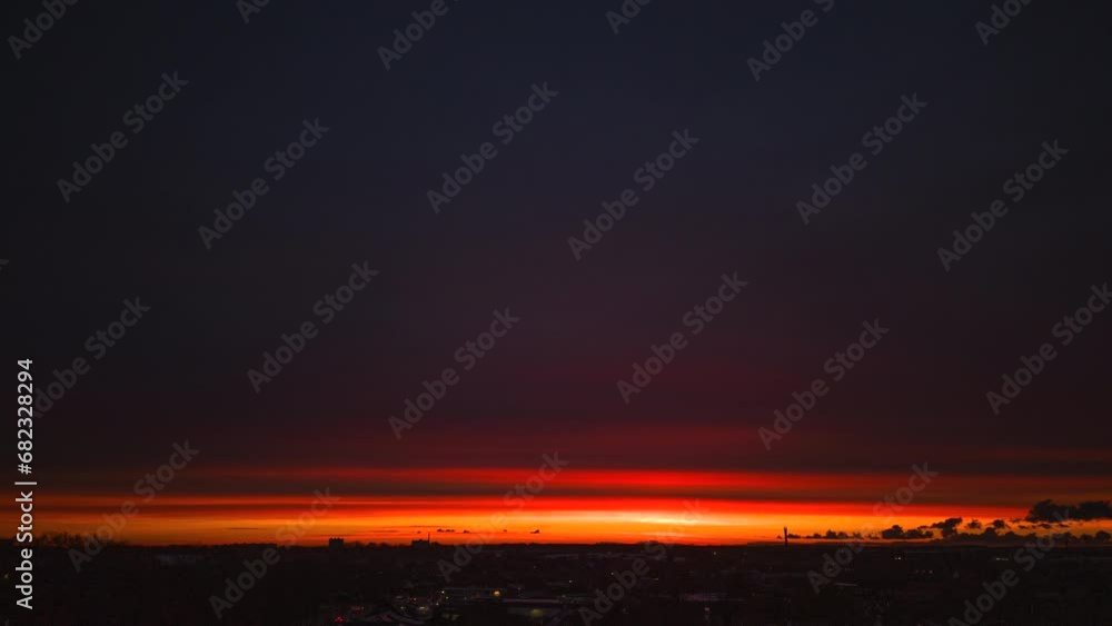 Timelapse of dark sunrise over urban area Timelapse of dark sunrise over urban area