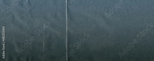 Gradient noise texture. Background with folded paper effect. Noise overlay texture with dots and scratches. Contemporary retro.