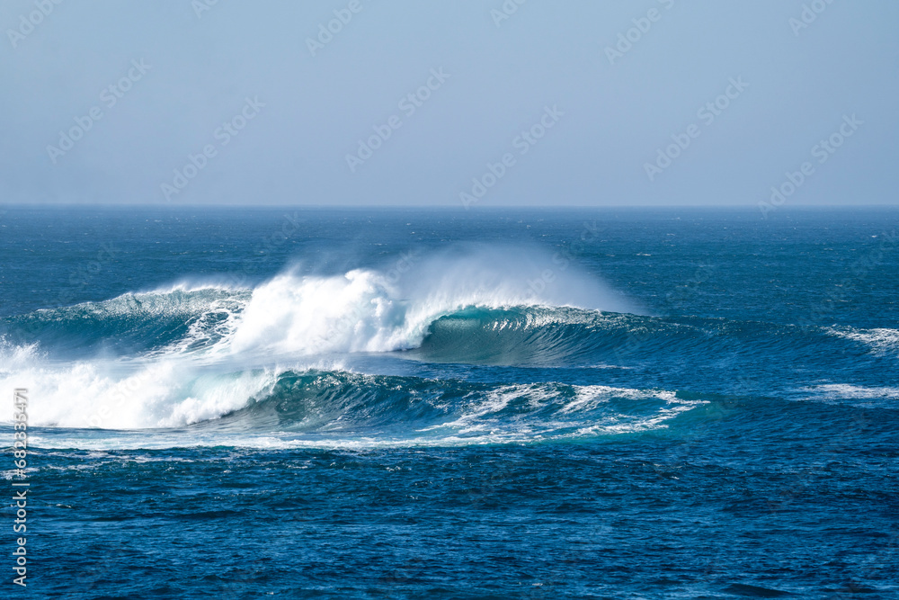 Perfect wave in Canary Islands. Ocean wave in Fuerteventura background