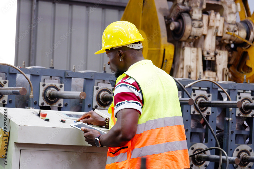 Engineer inspects machinery in industrial plants. Engineer inspects machinery in industrial plants.