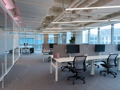 Interior of modern empty office building.Open white ceiling design.