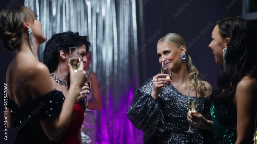 Merry Christmas And New Year Party, Group Of Women Friends Drinking Champagne And Chatting Merry Christmas And New Year Party, Group Of Women Friends Drinking Champagne And Chatting