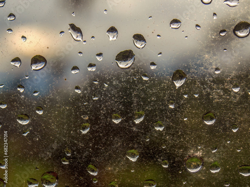 Macro photography of some rain drops on a window glass, captured on a farm in the eastern Andean mountains of central Colombia.