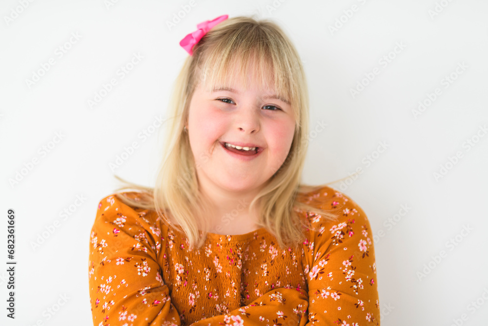 Portrait of beautiful little girl having down syndrome Portrait of beautiful little girl having down syndrome