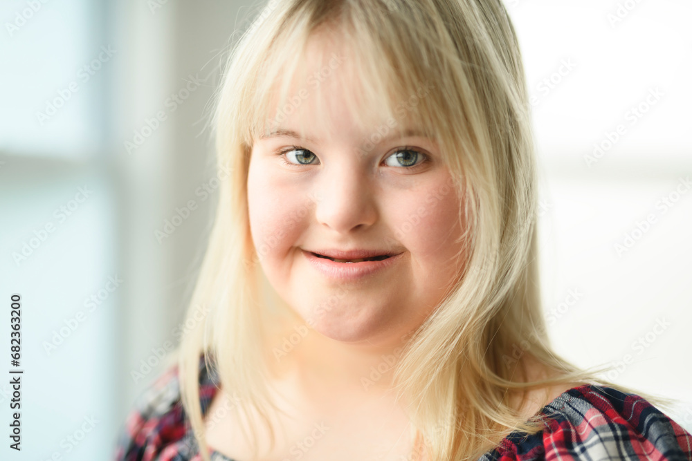 Portrait of beautiful little girl having down syndrome Portrait of beautiful little girl having down syndrome