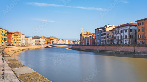 Pisa, Arno river and Ponte di Mezzo bridge. Lungarno view. Tuscany, Italy