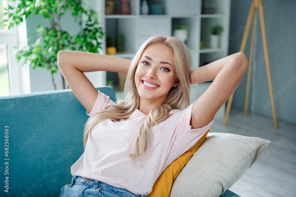 Photo of positive cute girl enjoying relax rest lying soft comfy sofa good mood free time holiday weekend at home indoors Photo of positive cute girl enjoying relax rest lying soft comfy sofa good mood free time holiday weekend at home indoors