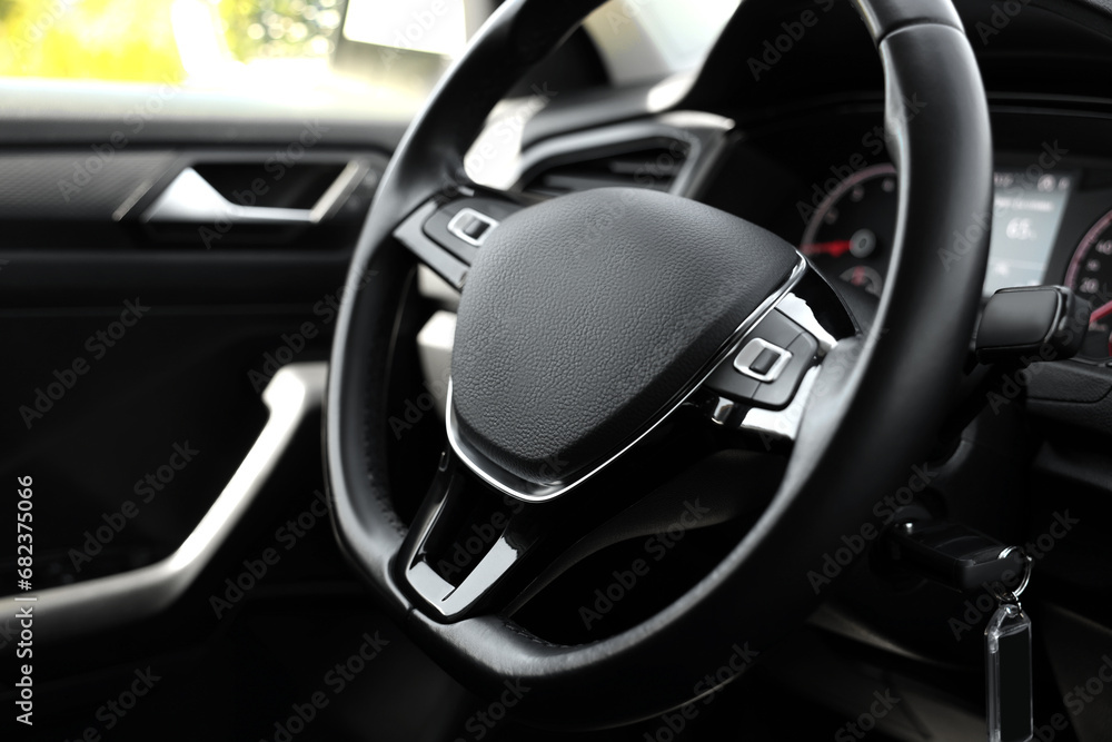 Safety airbag sign on steering wheel inside car Safety airbag sign on steering wheel inside car