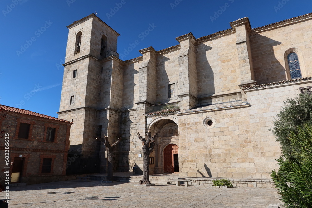Church of the Assumption, Cadalso de los Vidrios, Madrid, Spain, November 18, 2023: Square of the Parish Church of the Assumption (16th century). Cadalso de los Vidrios, Madrid, Spain